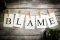 The Word BLAME Concept Printed on Cards