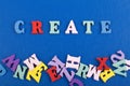 CREATE word on blue background composed from colorful abc alphabet block wooden letters, copy space for ad text. Learning english