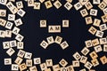 Word BOARD GAME with wooden letters on black board and letter in Royalty Free Stock Photo