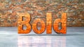 Bold brick letters resting on reflective floor against brick wall Royalty Free Stock Photo