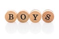 Word Boys from circular wooden tiles with letters children toy.