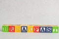 The word breakfast spelled with alphabet blocks Royalty Free Stock Photo