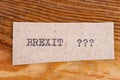 The word `brexit???` typed. The inscription on a gray sheet of pappier.