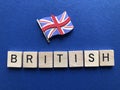 British,  in wooden 3d alphabet letters Royalty Free Stock Photo