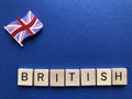 British,  in wooden 3d alphabet letters Royalty Free Stock Photo