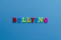 Word `bullying ` on blue background
