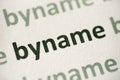 Word byname printed on paper macro Royalty Free Stock Photo