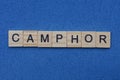 Word camphor from small gray wooden letters