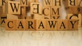 The word Caraway was created from wooden letter cubes. Gastronomy and spices.