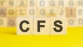 Word cfs made with wood building blocks, concept Royalty Free Stock Photo