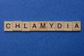 Word chlamydia made from brown wooden letters