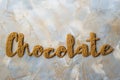 The word chocolate is written in cocoa Royalty Free Stock Photo