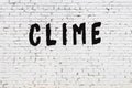 Word clime painted on white brick wall Royalty Free Stock Photo