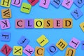 The word closed in colorful letters