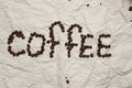 A word `Coffee` is laid out by coffee grains Royalty Free Stock Photo