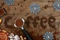 Word Coffee On Wooden Background