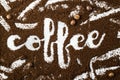 The word coffee is written on ground coffee Royalty Free Stock Photo