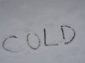 The word `cold` written in snow Royalty Free Stock Photo