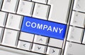 Word company on computer keyboard key Royalty Free Stock Photo