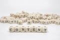 a word content on wooden cube block white background Royalty Free Stock Photo