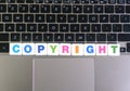 Word Copyright on keyboard background