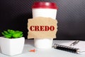 the word CREDO on a cup of coffee Royalty Free Stock Photo