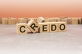word Credo made with wood blocks. text is written in black letters, light background