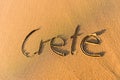 Word Crete written on the sand at sunset Royalty Free Stock Photo