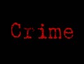 The word crime in red on a black background