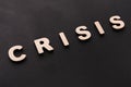 Word Crisis on black background Royalty Free Stock Photo