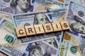 The word crisis on dollar usa background. Crash, bankruptcy and failure concept.