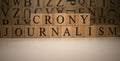 The word crony journalism was created from wooden cubes. Countries and politics Royalty Free Stock Photo
