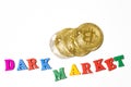 Word dark market and bitcoin cryptocurrency coins top view. White background with copy space