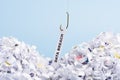 Word Data breach hooked on fishing hook pulled from pile of shredded documents