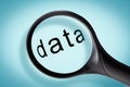 Word data seen through a magnifying glass Royalty Free Stock Photo