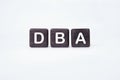 Word DBA (Database administrator) on cubes on a white background