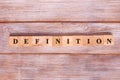 Word definition written on wood block on wooden background. Business concept Royalty Free Stock Photo