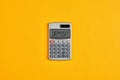 The word deposit on calculator display with yellow background. Business finance Royalty Free Stock Photo