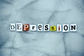 Word depression of cut letters on gray background. A word writing text showing depression. Abstract card with an inscription on gr