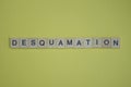 Word desquamation made from wooden letters Royalty Free Stock Photo
