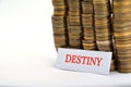 Word destiny with coins isolated on white Royalty Free Stock Photo