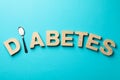 Word Diabetes made of wooden letters on background