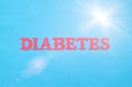 Word diabetes in red letters on a blue background. The concept of chronic endocrine disease in humans, treatment of type