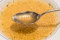 The word diat with letters of a letter soup on a spoon Royalty Free Stock Photo