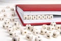 Word Dispute written in wooden blocks in red notebook on white w Royalty Free Stock Photo