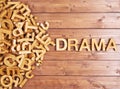 Word drama made with wooden letters