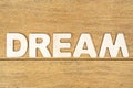 Word dream on a wooden table Royalty Free Stock Photo