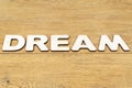 Word dream on a wooden table Royalty Free Stock Photo