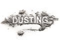 Word dusting written in accumulated pile of grey dirt, filth, dust, ash, soil Royalty Free Stock Photo