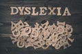 Word dyslexia on a wooden background